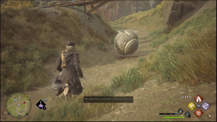 It is enough to use these spells a few times for the ball to roll down by itself and hit the target - Hogwarts Legacy: Hogwarts Valley - all Merlin Trials - Merlins Trials - Hogwarts Legacy Guide