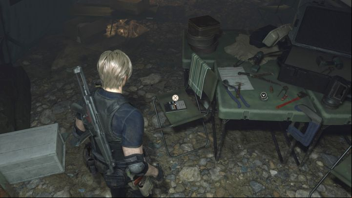 For this one, stay in the mentioned large tent south of Campsite - Resident Evil 4 Remake: Files map - Island - Secrets - Resident Evil 4 Remake Guide